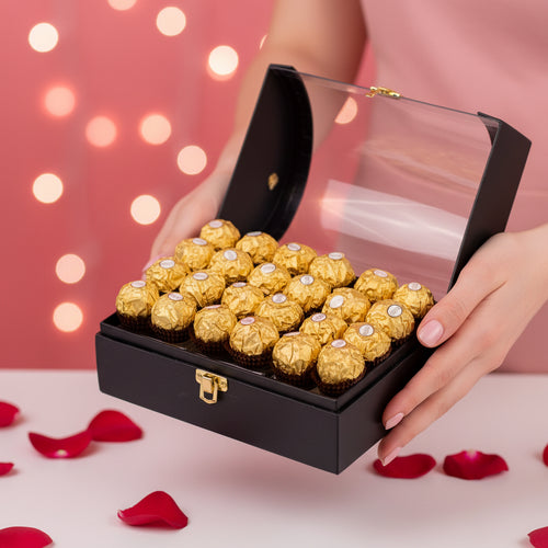 Ferrero Rocher luksuzna crna poklon kutija sa zlatnim čokoladicama, premium poklon Srbija, pokloni Srbija online, poslovni poklon Beograd Novi Sad Niš, romantično iznenađenje za nju i njega, online iznenađenje dostava, luksuzni slatki poklon, Ferrero poklon kutija Srbija, ideja za poklon godišnjica rođendan, premium čokoladni poklon set